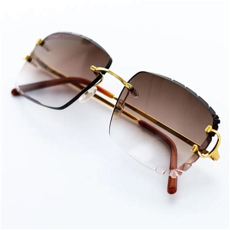 c de cartier signature sunglasses|rimless big c cartier glasses.